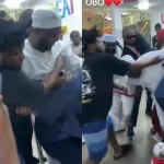Moment Overzealous Fan Nearly Drags Davido To The Ground