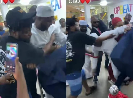 Read more about the article Moment Overzealous Fan Nearly Drags Davido To The Ground