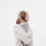 Nigerian Star Tems Partners With Luxury Watch Brand OMEGA