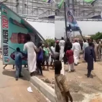 Read more about the article Angry Youths Destroy President Tinubu’s 2027 Campaign Billboard In Kano State