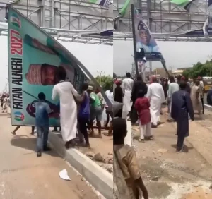 Read more about the article Angry Youths Destroy President Tinubu’s 2027 Campaign Billboard In Kano State