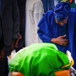 Read more about the article Tinubu Bows Before Buhari’s Remains At Daura Funeral