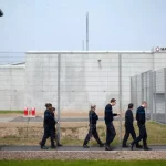 Read more about the article Prisoner Escapes By Hiding Inside Fellow Inmate’s Luggage