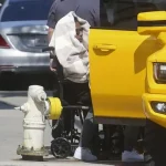 Read more about the article A$AP Rocky Spotted In A wheelchair As He’s Helped Into Car