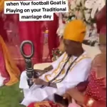 Read more about the article Nigerian Groom Caught Watching His Football Idol During His Traditional Wedding