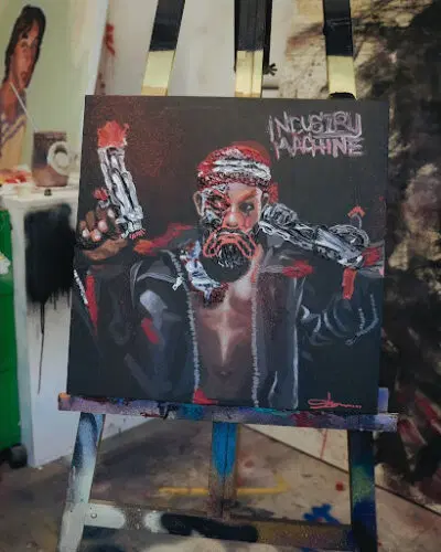 Read more about the article OFFICIAL: Odumodublvck Unveils Industry Machine Artwork By Slawn